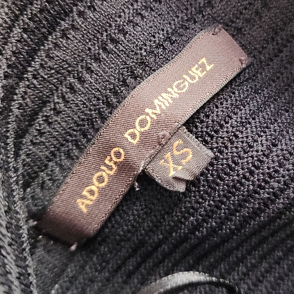 Adolfo Dominguez is a black sophisticated dress. - Picture 3 of 8